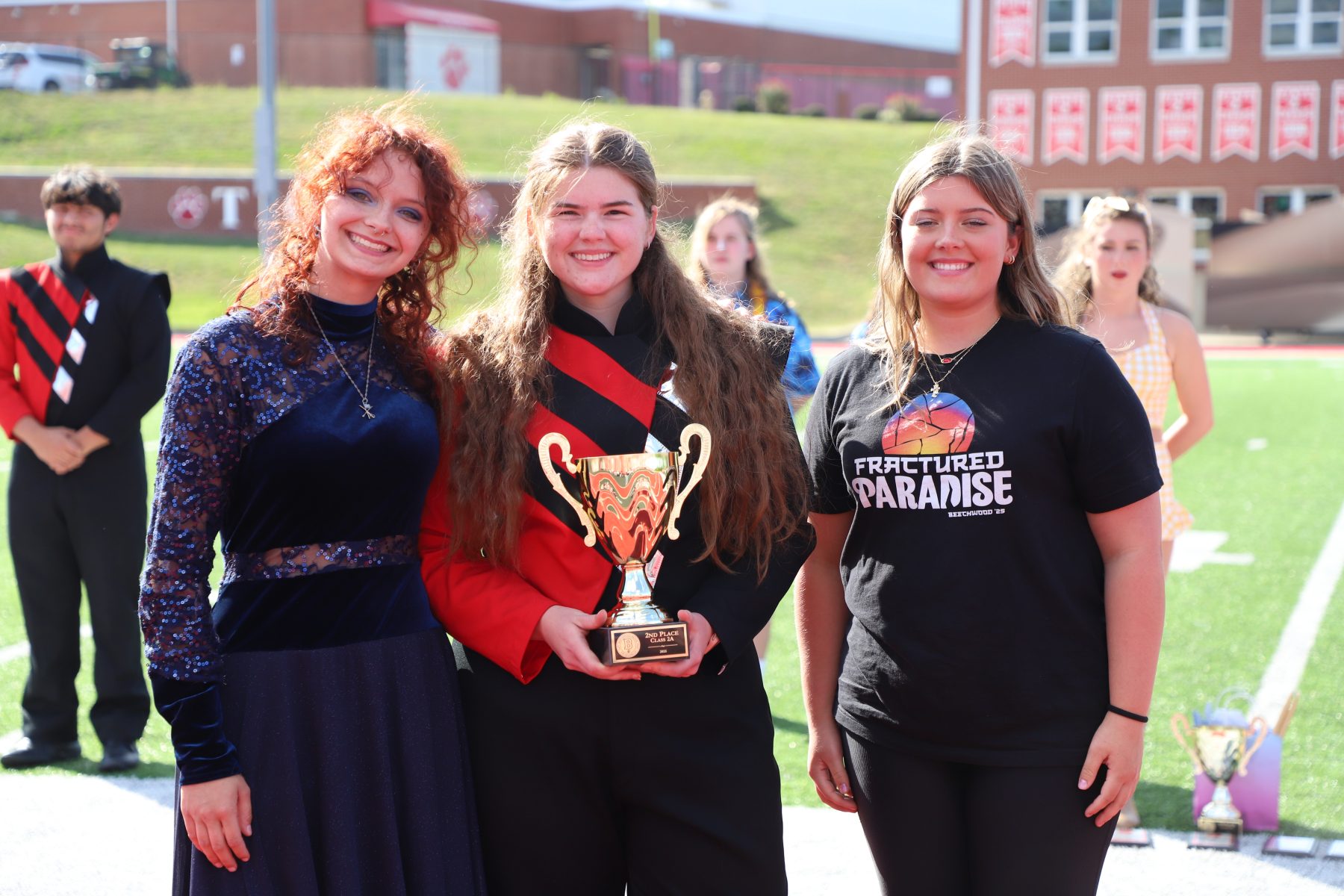 Award winners holding a trophy at the 2025 Festival of Bands